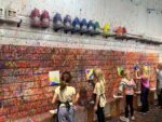 Kids classes having fun on the splatter wall