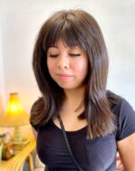 long shag haircut, brunette